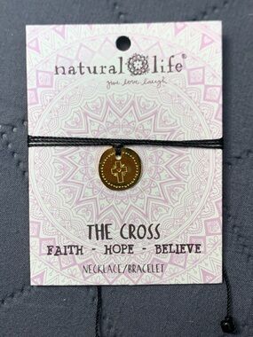 NATURAL LIFE gold cross charm on black cord bracelet